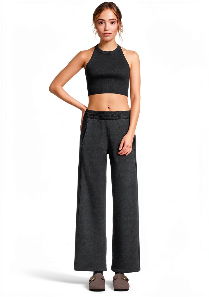 Free People womens sweatpants in black worn in a relaxed setting