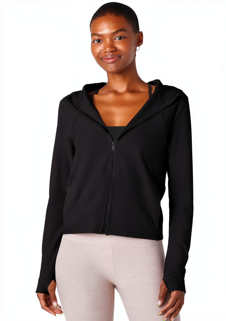 Beyond Yoga Spacedye High Energy Hoodie in Birch Heather color on a woman during yoga