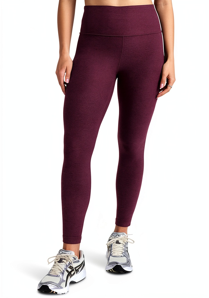 Woman wearing Beyond Yoga Spacedye Midi Leggings during a yoga pose